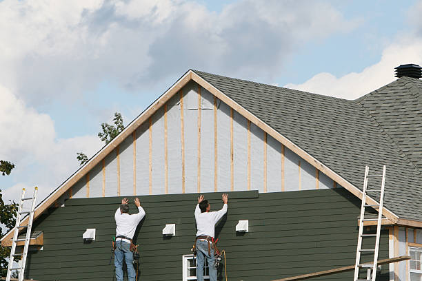 Professional Vinyl Siding technician working in North East, PA